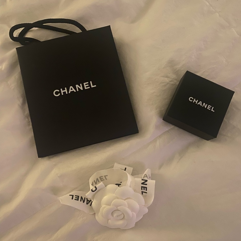 CHANEL Black Bag and Box with White Flower